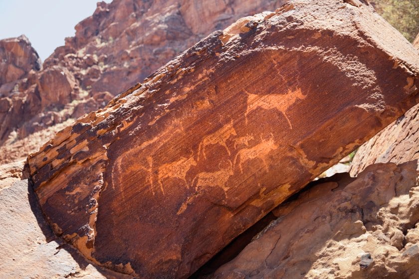 Ancient bushmen rock engravings (petroglyphs) at Twyfelfontain in Damaraland, Namibia